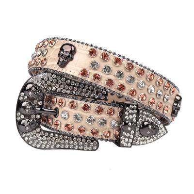 China Western Basic Crocodile Studded Leather Belt Dusty Pink Skull Belt Bling Bling Fashion Rhinestone Skull Belt for sale