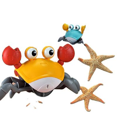 China Cogs Wetting Crawling Toy Children's Simulation Animal Toy Automatic Induction Crab Toy for sale