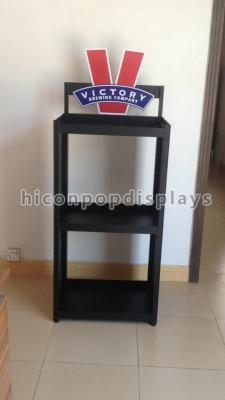 China Waterproof Wine Display Stand Free Standing Wine Display Rack With Printed Logo for sale