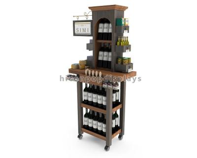 China Customized Wine Retail Store Display Fixture 4 Legs Bamboo Wood Wine Display Rack for sale