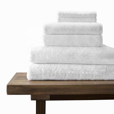 China Disposable Luxury Pure White 60s Face Hotel Terry Bath Towels Linen Beach Towel 100% Cotton 60s for sale