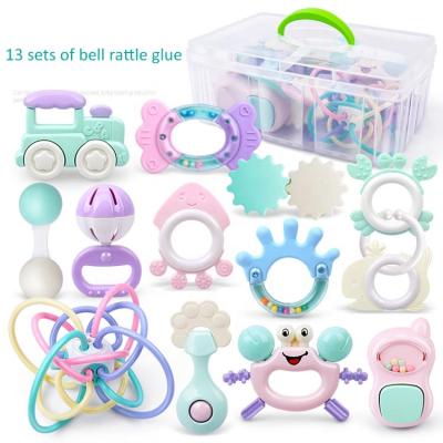 China 2021 Animal Chew Toy Infant Handbell Set Soft Toy Fruit Shape Bell Teething Toy Baby Rattle Silicone Teether With Box for sale