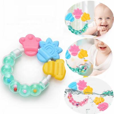 China Baby Toothbrush and Silicone Teether Soother Teethers Toy Chew Silicon Sensory Newborn Teether for Babies Scares Milk Teeth for sale