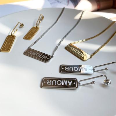 China Non Tarnish TRENDY Jewelry Plated Love Intrigue Pendant Necklace Gold Custom Necklaces Stainless Steel Rope Chain Rectangular Writing Image for sale