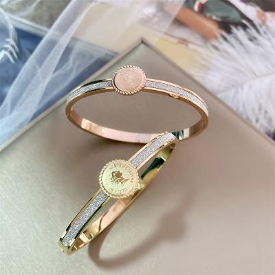 China Micro-inlaid Design Trendy Queen Fashion Key Bracelet With Zirconium All-match Open Stainless Steel Non Fading Bracelet for sale