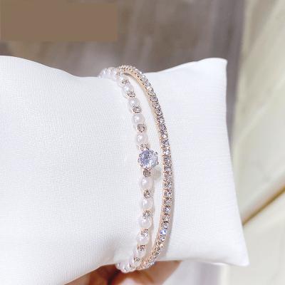 China FASHIONABLE Newcomer Elegant Shiny Crystal Pearl Beaded Open Bracelet Gold Plated Multi Layered Bracelet Women Anklet Chain Bracelet for sale