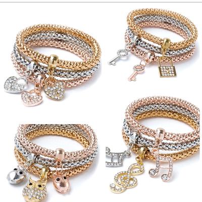 China FASHIONABLE wholesale hot selling 3 PCs Crystal Butterfly Popcorn Elastic Bracelets set heart lock charm bracelet for women for sale