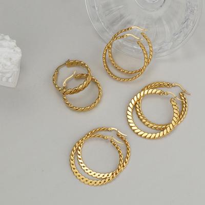 China New Trendy Crescent Chunky Twisted Earrings Stylish 18K Gold Stainless Steel Circle Titanium Steel Entwined Earrings for sale