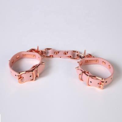 China BDSM Lifestyle Loverfetish Newcomer Bondage Bdsm Games Couples Fun Pink Leather Adult To Role Play Handcuff Rivet Style for sale