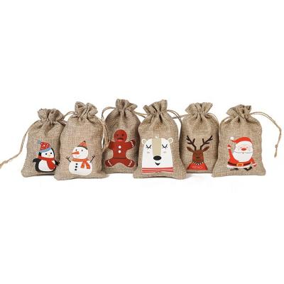 China Durable Drawstring Bag Christmas Burlap Bags Print With 6 Style Cute Designs Eco-friendly Christmas Natural Burlap Bags for sale