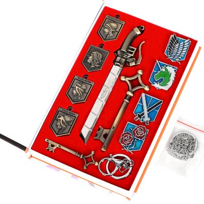 China Japan Anime Shingeki No Kyojin Attack On Titan Badge Necklaces Keychain Metal Weapon Set for sale