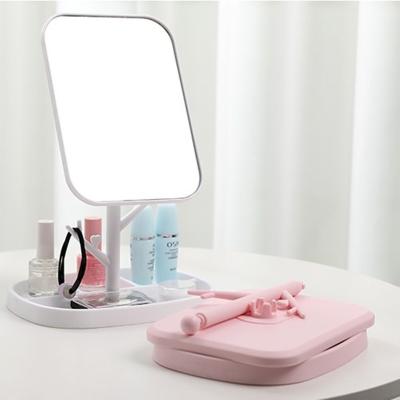 China Nordic Style Monocular Mirror Desktop Plastic Sight Rotating Makeup Mirrors With Storage Bracket for sale