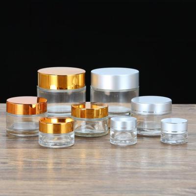 China Small MOQ 5g 15g 20g 30g 50g 100g customzie personal care small glass jar for face cream for sale