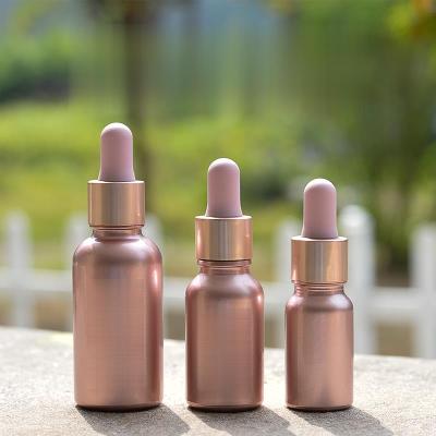 China Customized Personal Care 10ml 15ml 30ml Rose Top Dropper Glass Bottle With Dropper for sale