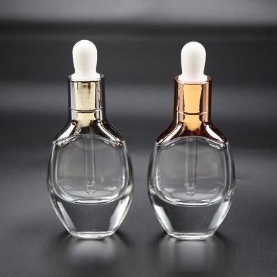 China Personal Care Small MOQ Rose Gold Pearl Cosmetic Glass Dropper Bottle for sale