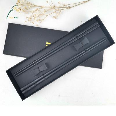 China Sustainable Market Popular Dishwasher Safe Glassfiber Reusable Black Chopsticks Set With Rest For 2 Person for sale