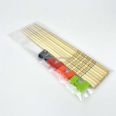 China Direct Marketing Coil Rainbow Stripe Sustainable Bamboo Colorful Bamboo Non-Slip Household Charred Chopsticks Set With Help for sale