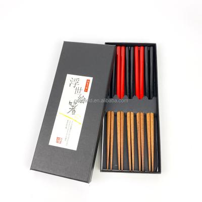 China Sustainable Restaurant Japanese Classic Wooden Black And Red Paint Thin Tip Sushi Chopsticks for sale