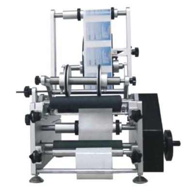 China Manual Food Round Bottle Labeling Machine Suitable For Circumference Of Various Cylindrical Objects for sale