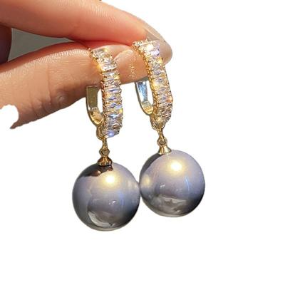 China Fashion Elegant Round Pearl Dangle Earrings Shining Graceful Women Engagement Wedding Accessories Fashion Earrings for sale