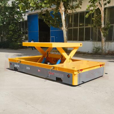 China 5 Tons Scissor Lift Omnidirectional Mobile Steering Wheel Transfer Cart for sale