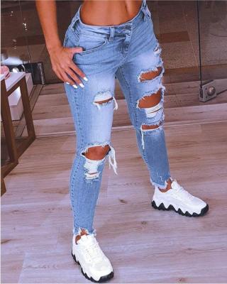 China New Trend 2021 Fashion Plus Size Breathable Mid Waist Women's Exhaust Skinny Ripped Denim Jeans Woman for sale