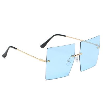 China Hot Selling Fashion Sunglasses New Women Personalized Oversized Rimless Mirror Female Sunglasses for sale