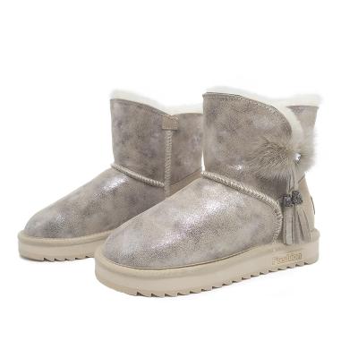 China 2021 Winter Warm Girl's Best Selling Faux Stone Fur Sheepskin Tassel Tassel Durable Short Snow Boots for sale