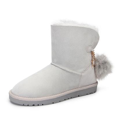 China Thermal High Quality Rhinestones Star Double Pom Pom Ball Face Sheepskin Fur Ankle Snow Boots For Women for sale