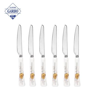 China Wholesale Customized Viable Fruit Stainless Steel Flower Handle Mini Serving Knife Ceramic Elegant Silver Color Dessert Knife Cake for sale