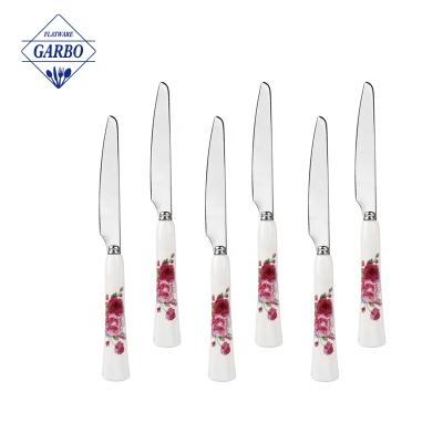 China Sustainable Wedding Party Birthday Utensils Tableware 420 Stainless Steel Fruit Knives Heavy Duty Ceramic Handle Dessert Knives With Flower for sale