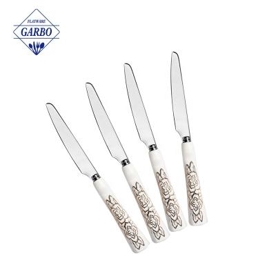 China Hotel Restaurant Silverware Flatware Set Hexagon White Flower Porcelain Handle 420ss Fruit Cake Dinner Viable Serving Knife for sale