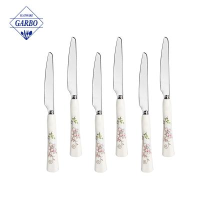 China Wholesale Disposable Food Grade 420 Cheese Dessert Mini Knife Stainless Steel Butter Knife With Ceramic Printing Handles For Restaurant for sale