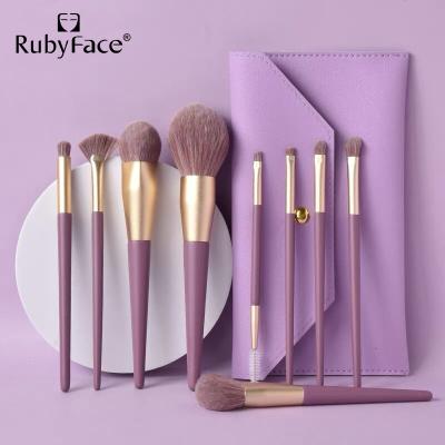 China Angular Blush 2022 New Arrival Makeup Brush Purple Makeup Brush Set Synthetic Handle Makeup Brush With Purple Bag for sale