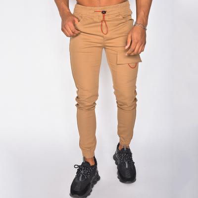 China Anti-Wrinkle Mens Cargo Pants Khaki Adjustable Cargo Joggers Belt Joggers Pants With Front Pockets for sale