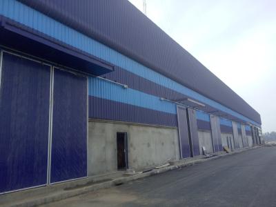 China Metal Construction Prefab Warehouse Building Sandwich Panel Roofing Systems For Space Optimization for sale