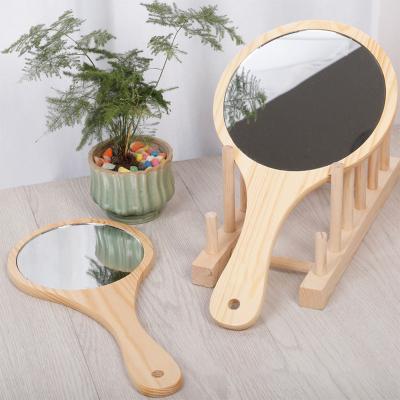 China Retro Custom Handmade Original Wooden Vanity Mirror Dressing Table Mirror Carry Makeup Handle Convenient Mirror for sale