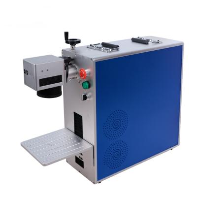 China Laser Marking Fiber/UV/CO2 2D 3D Mini Workbench 30W Metal Laser Marking Machine For Gold Jewelry for sale