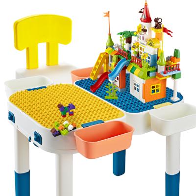 China Multifunctional 2 In1 Building Blocks Building Toy Board With Storage Box Educational Block Desk Toys For 1/2/3 Year Toddler for sale