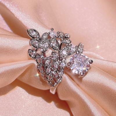 China FASHIONABLE Jewelry KYRA01519 New Arrival Creativity Shine Elegant Leaf Shape 3A Zircon Ring For Women for sale