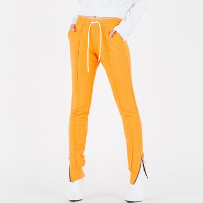 China Custom Size Cotton Drawstring Anti-Wrinkle Ladies Slim Fit Joggers Pants Orange Women With Ankle Zippers For Ladies for sale