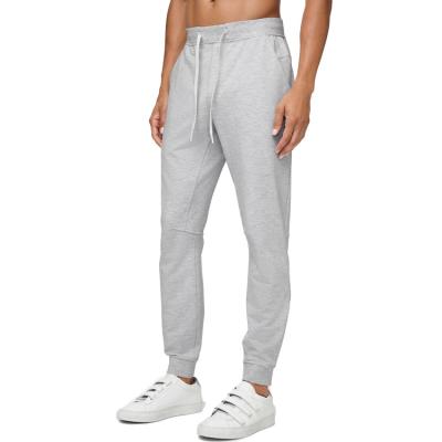 China Anti-Static Men Running Hidden Back Sports Tracksuit Terry French Pants Pocket Design Joggers for sale