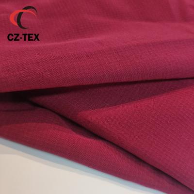 China Red Anti Pill Ready Goods 92% Polyester ribstop 8% Spandex Fabric For Long Sleeve Scrub for sale