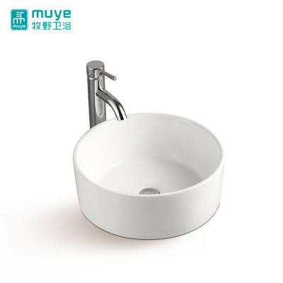 China Modern Desgin Round Bowl Shape Bathroom Luxury Sink Above Counter Mounted Ceramic Wash Basin for sale