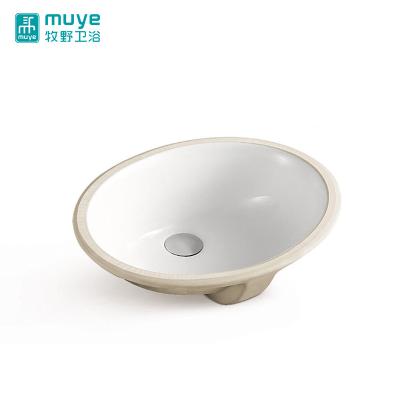 China Easy Clean China Made Sink Glossy Oval Shape Ceramic Basin Under Counter Wash Basin for sale