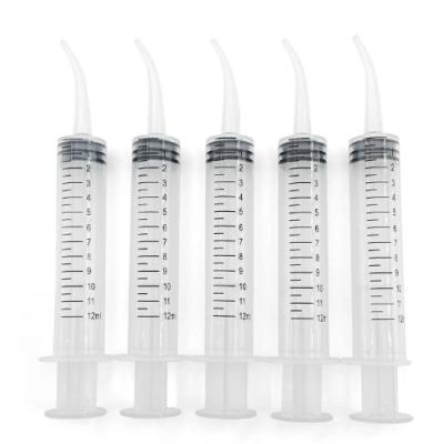 China Disposable Transparent Dental Irrigation Syringe With Curved Tip 12ml Dental Care Tools With CE ISO Te koop