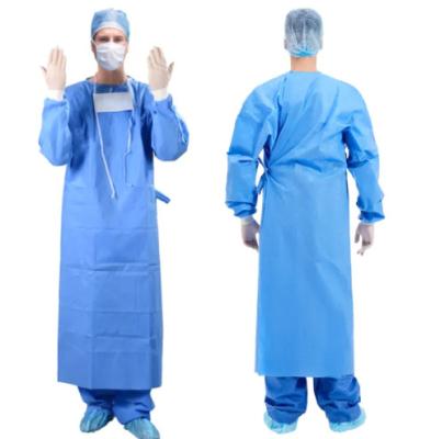 China Refuerzo vestido de cirugía azul plástico desechable vestido de aislamiento impermeable delantal de plástico con envíos rápidos en venta