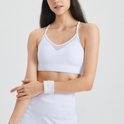 China 2022 Unique Design Hot Selling Antibacterial Mesh Stitching Shockproof Sleeveless Womens Sports Bras Fitness Apparel for sale