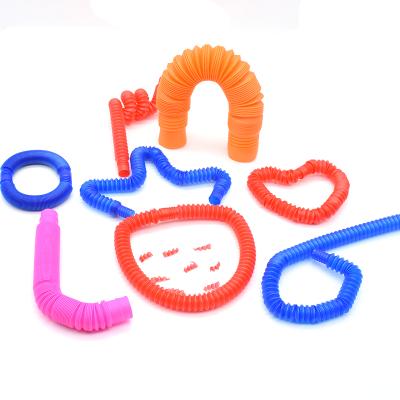 China PE noise tubes stir toy for kids and adults, sensory stir person toys jump tube for autistic kids, worry relief jumping pipes for sale