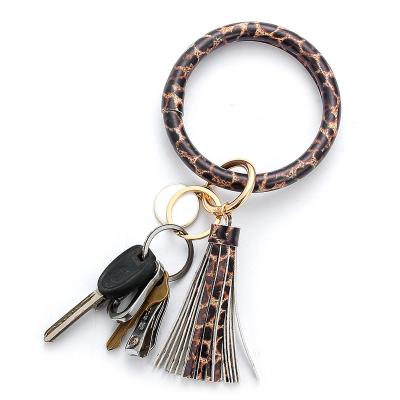 China Promotion New Arrival Stock Item Fashion PU Tassel Bracelet Metal Wholesale Gift/Souvenir/Key Chain for sale